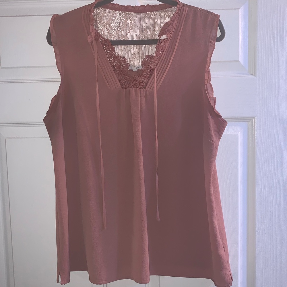 Mauve colored sleeveless top
